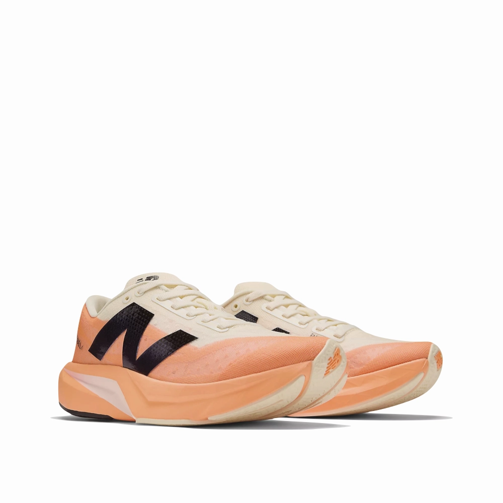 New Balance Women's FuelCell Rebel v4 Sneaker in Hot Mango/Angora/Black New Balance Skater Shoes
