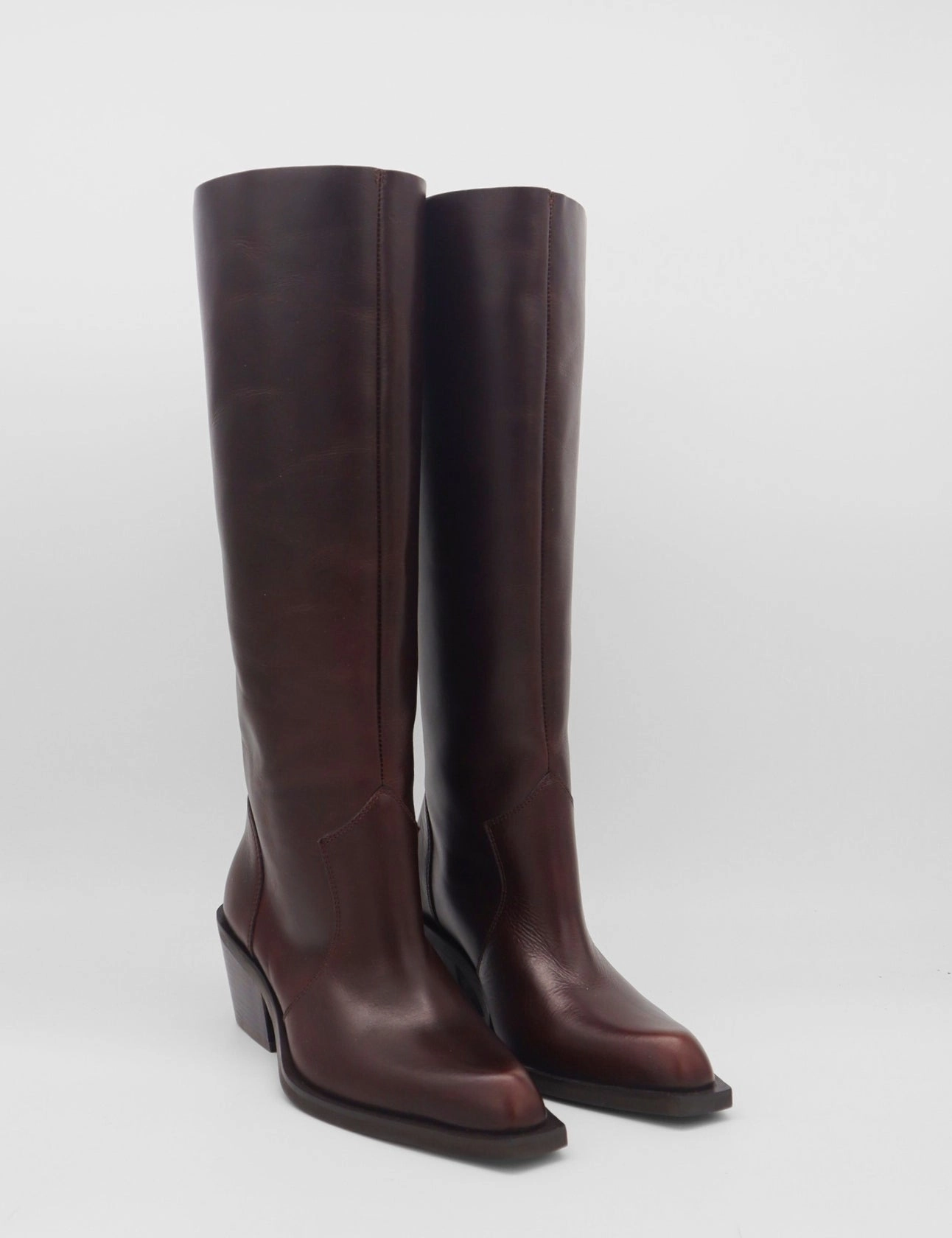 The Knee-high Banana Heel Boot Runaway knee-high tall boots in brown deep burgundy leather women's shoes