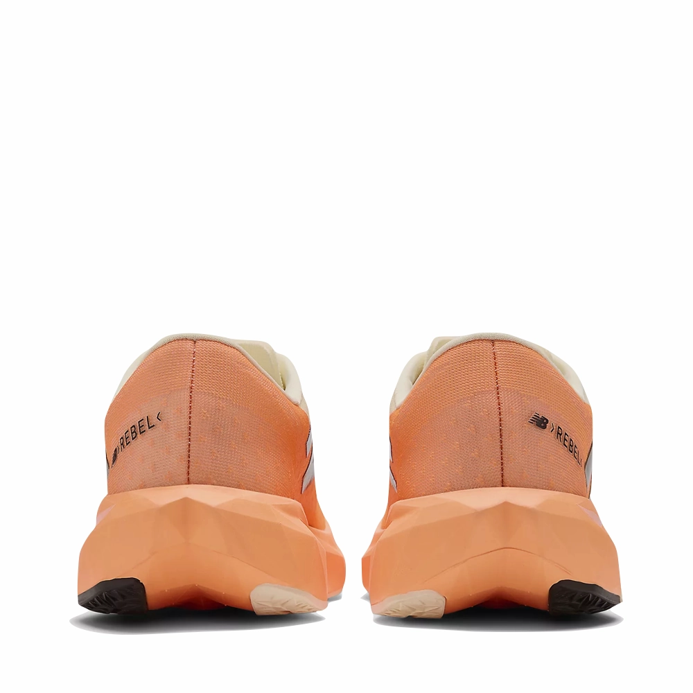 New Balance Women's FuelCell Rebel v4 Sneaker in Hot Mango/Angora/Black New Balance